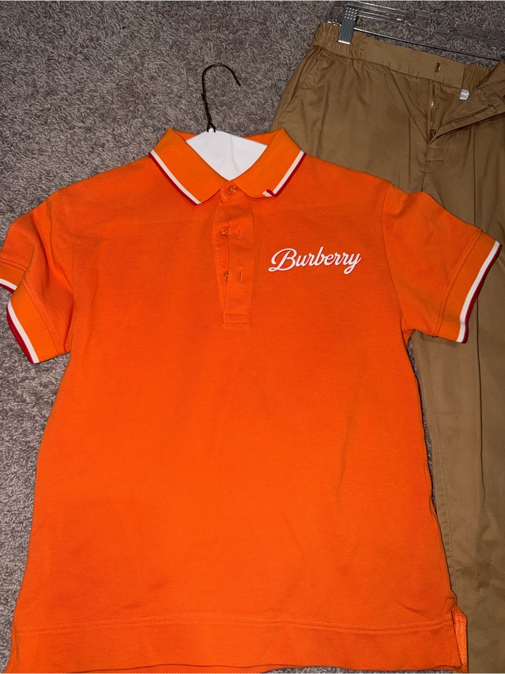 Burberry Orange Polo with White Script and Trim